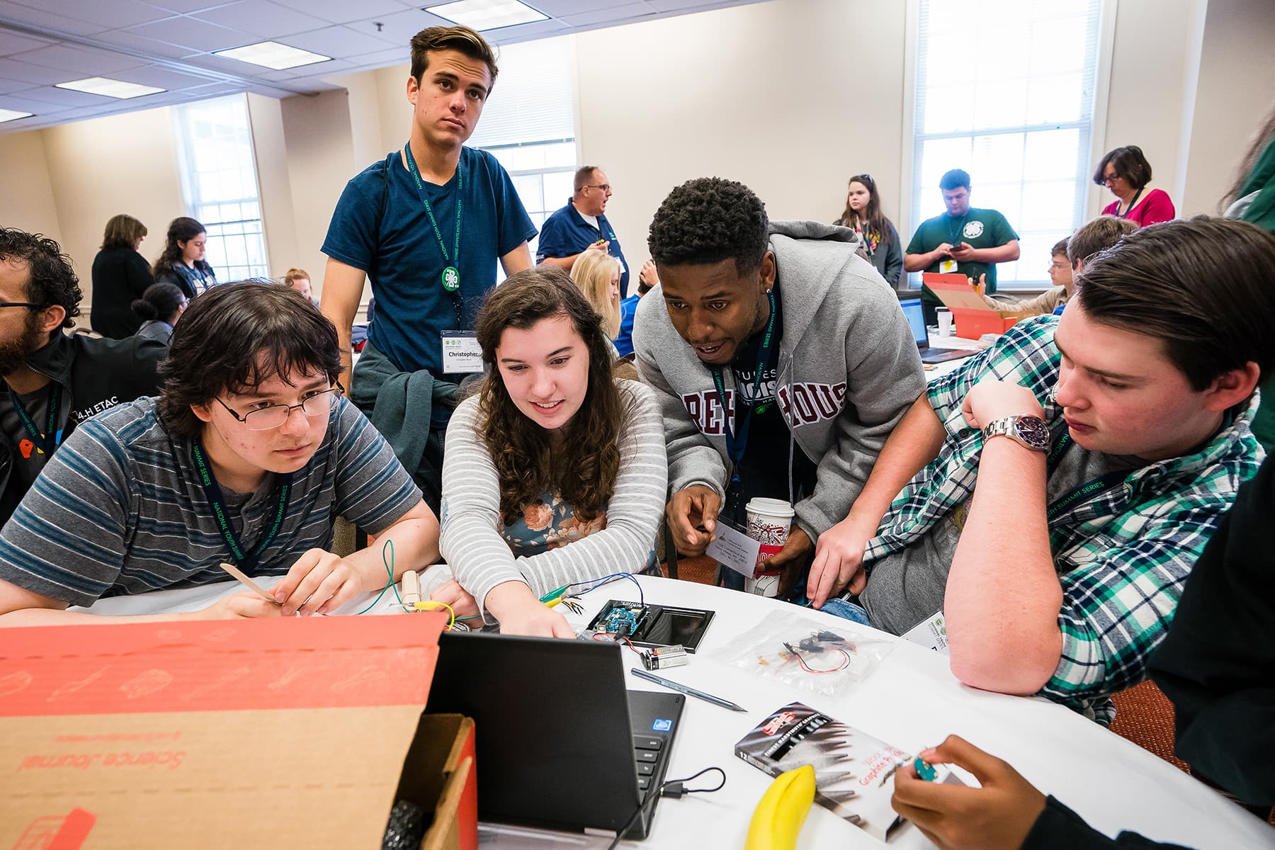 Youth working together on a STEM project