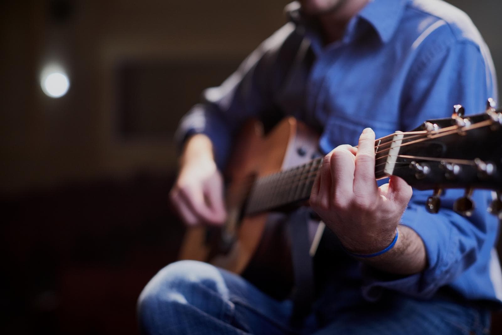 Youth playing guitar