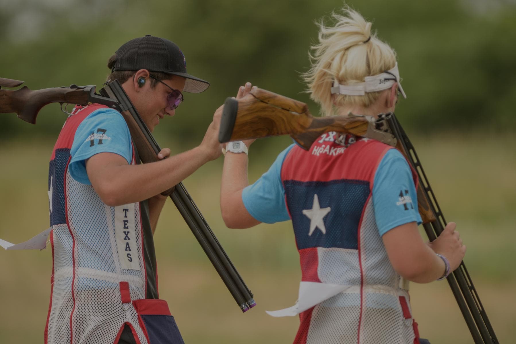 Youth participating in a shooting sports rifle event