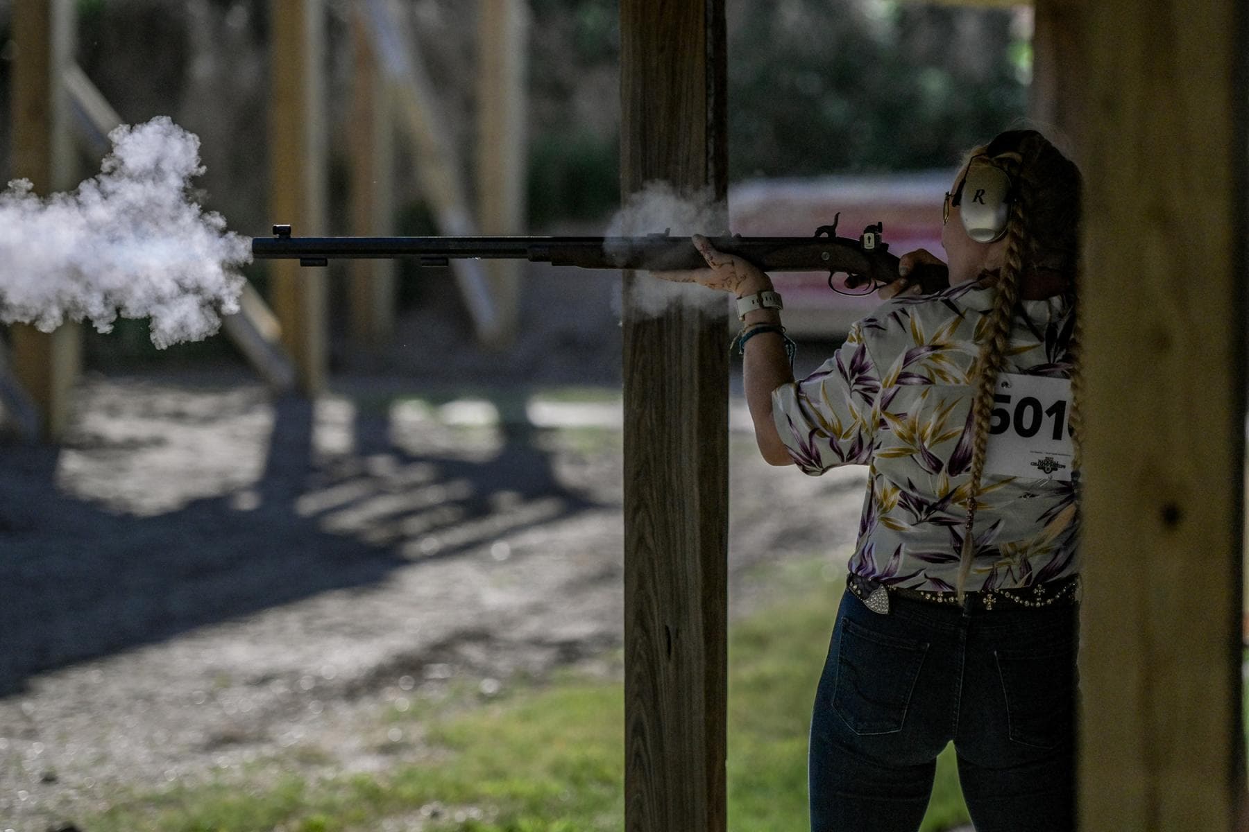 Youth participating in a shooting sports shotgun event