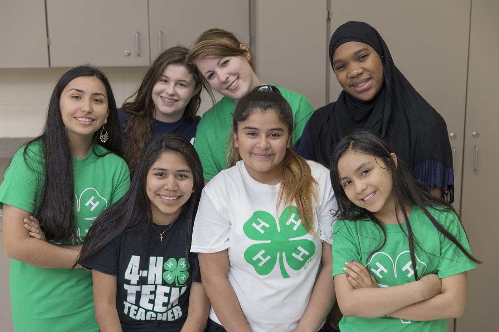 Youth smiling for a group photo