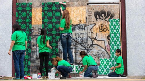 4-H participants completing a community service project.