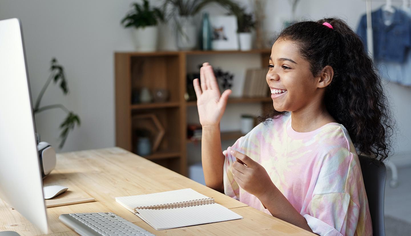 girl raising her hand in a virtual experience